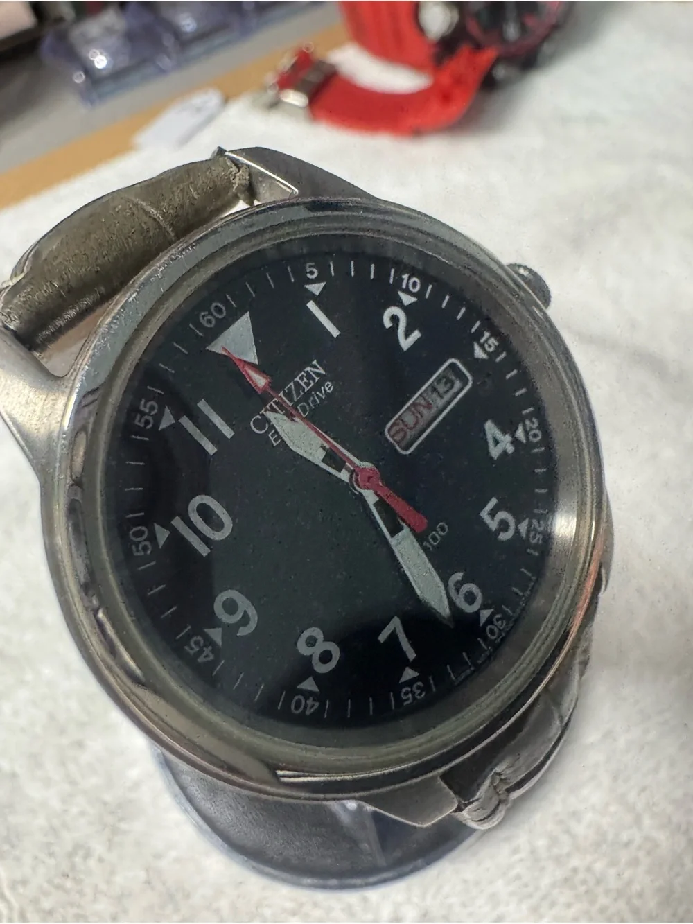 Citizen Men's Black Dial Watch with Red Second Hand and Brown Strap